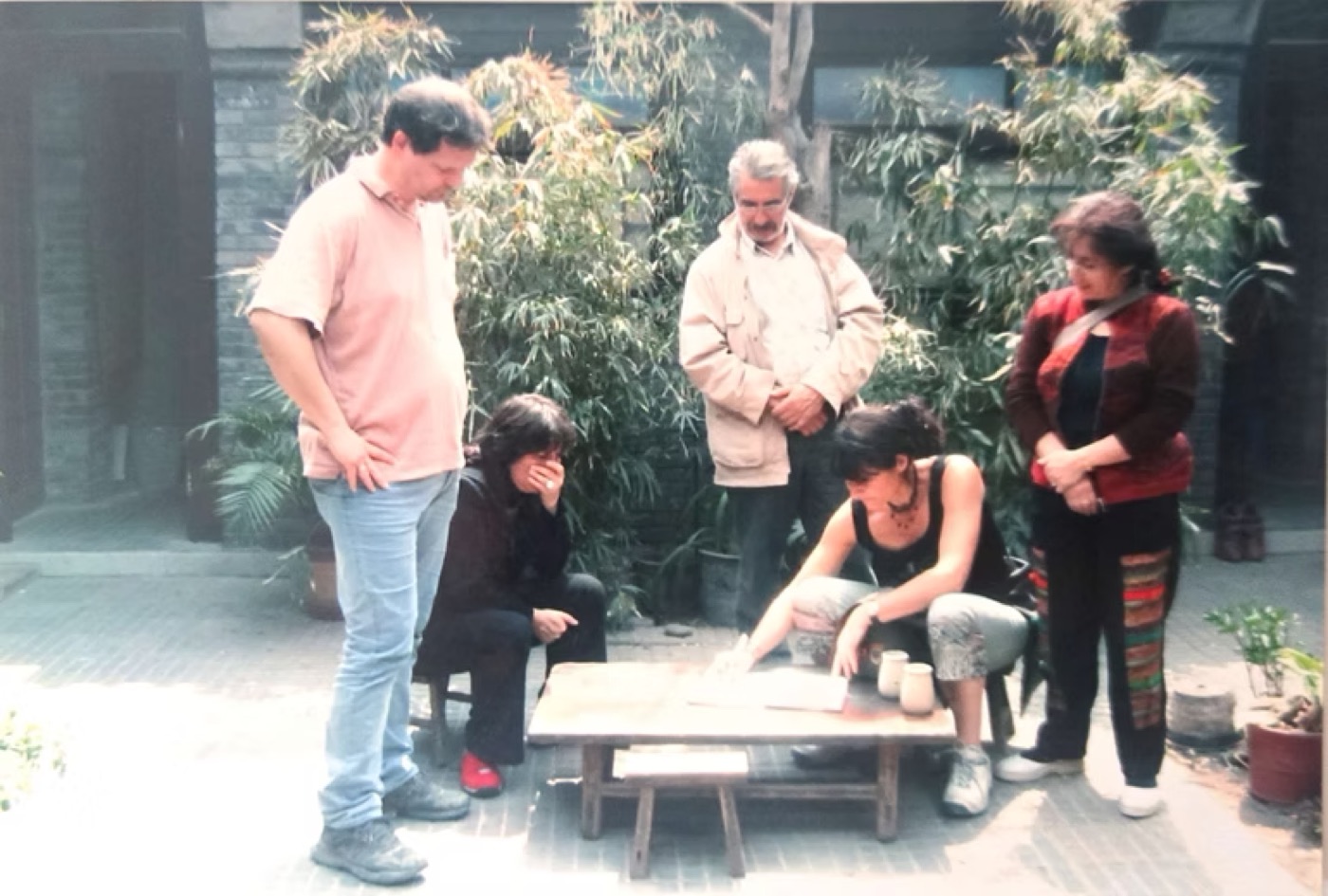 Guests sharing an afternoon in the courtyard
